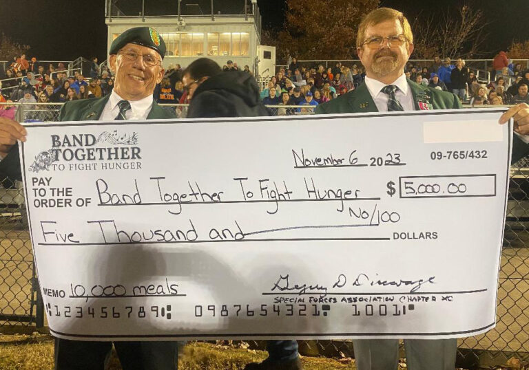 SFACH90 members present a donation to Band Together To Fight Hunger