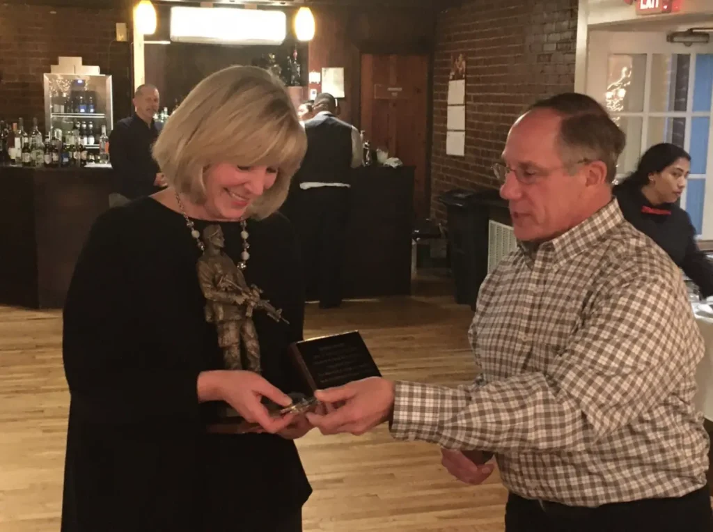 Chapter president presenting an award